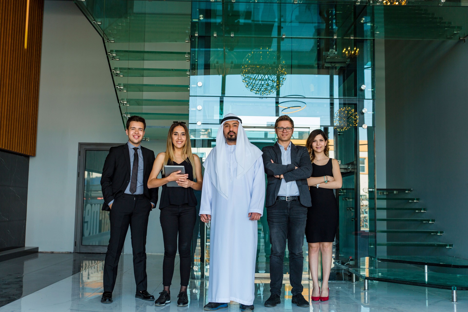 Portrait of business team with an Arab Businessman